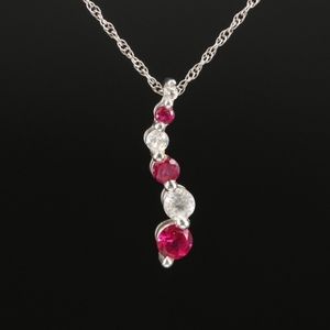 10K WHITE GOLD RUBY AND SAPPHIRE JOURNEY PENDANT ON 14K WHITE GOLD CHAIN